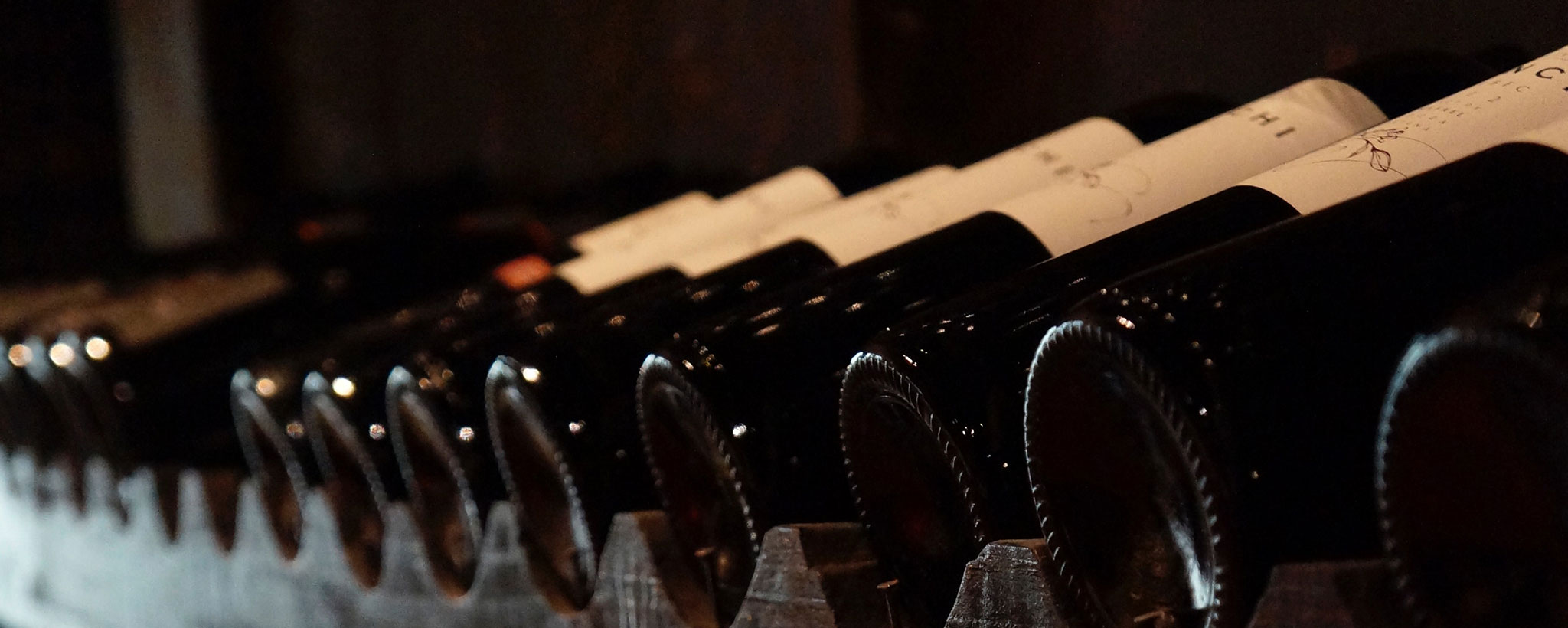long row of bottles of wine